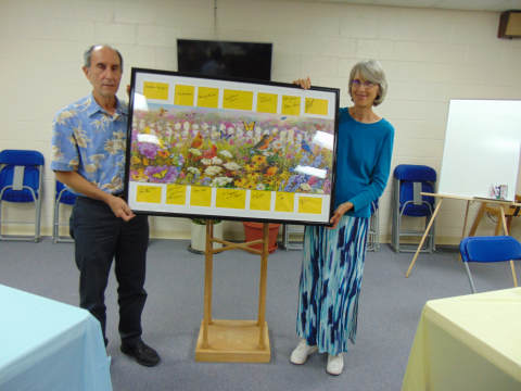 Pastor Brad and his wife Susan are displaying a nature puzzle created by Laura and Anna Simons.